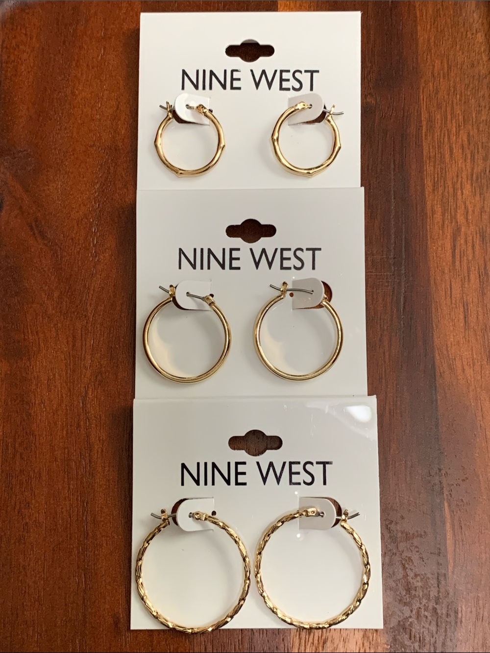 NWT Nine West 3 pair set of gold tone hoop earrings